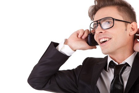 Business man at the phone, isolated over whiteの写真素材