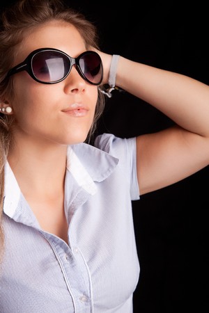 Young and beautiful woman posing - isolatedの写真素材