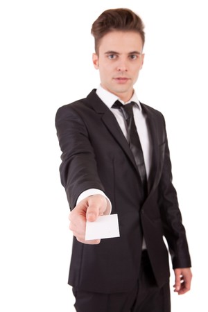 Business man offering card - selective focus on cardの写真素材