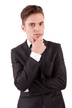 Young business man posing, isolated over whiteの写真素材
