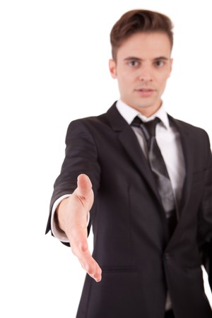 Young engineer, offering handshake - selective focus on handの写真素材