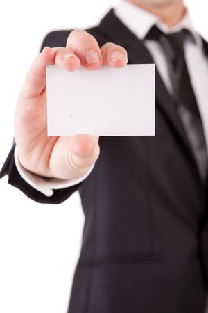 Business man offering card, isolated over white backgroundの写真素材