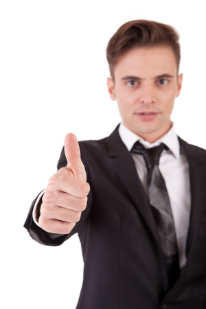 Business man showing thumb up - selective focus on handの写真素材