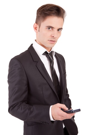 Business man at the phone, isolated over whiteの写真素材