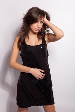 Young and beautiful woman posing - isolatedの写真素材