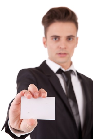 Business man offering card - selective focus on cardの写真素材