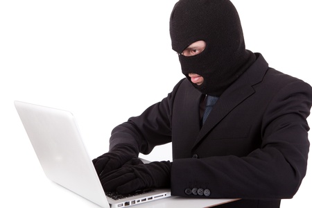 Computer hacker in suit and tieの写真素材