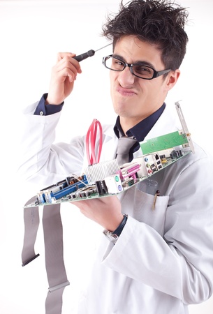 Computer engineer working on an old motherboardの写真素材