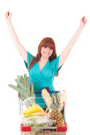 Beautiful young woman shopping at the supermarketの写真素材