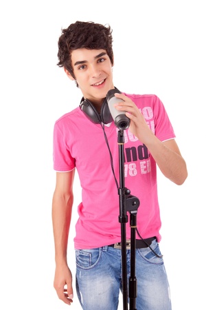 A young handsome boy singing - over whiteの写真素材