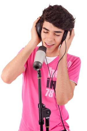 A young handsome boy singing - over whiteの写真素材