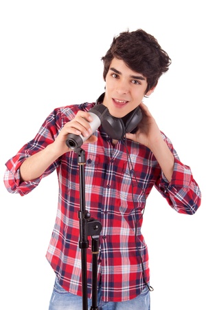 A young and handsome boy singingの写真素材