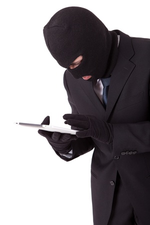 Disguised computer hacker in suit and tieの写真素材