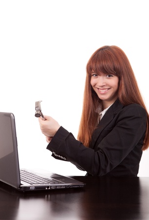 Fustrated businessman in her office threatening to destroy her PC with a hammer out of sheer frustration
の写真素材