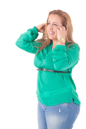 Happy large woman posing over a white backgroundの写真素材