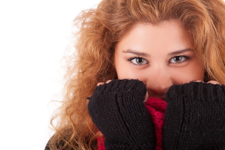 A beautiful young woman dressed for winterの写真素材