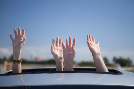 Young happy women leaving for vacationsの写真素材