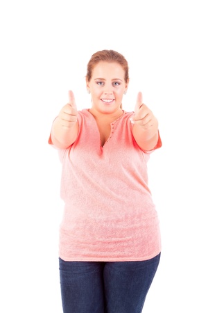 Happy overweighted woman posing isolated over white backgroundの写真素材