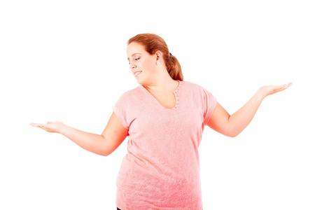 Happy overweighted woman posing isolated over white backgroundの写真素材