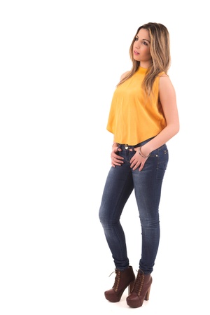 Young student woman posing over white backgroundの写真素材