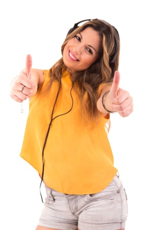 Happy young woman listening to musicの写真素材