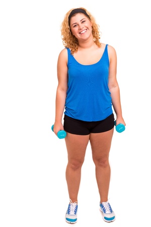 Beautiful large woman exercising - isolated over a white backgroundの写真素材