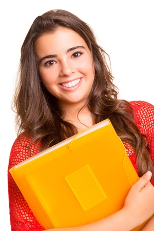 Young student woman posing over white backgroundの写真素材