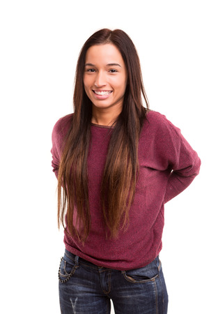 Beautiful young asian woman posing isolated over white backgroundの写真素材