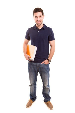 Young happy student posing isolated over white backgroundの写真素材