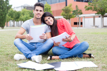 Couple of happy students at the university campusの写真素材