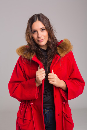 A beautiful young woman dressed for winterの写真素材