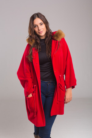 A beautiful young woman dressed for winterの写真素材