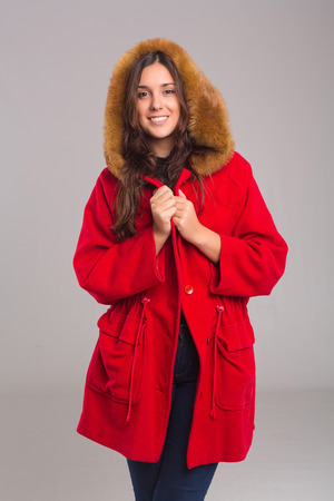 A beautiful young woman dressed for winterの写真素材
