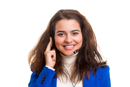 A friendly telephone operator smiling isolated over a white background