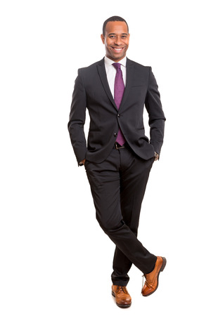 Young handsome african business man posing isolated over whiteの写真素材