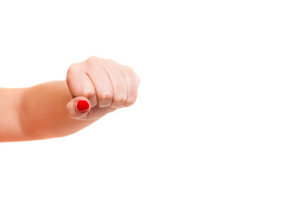 An isolated fist punching towards the camera