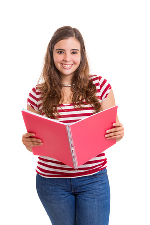 Young student woman posing over white backgroundの写真素材
