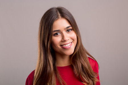 Studio shot of a beautiful young casual womanの写真素材