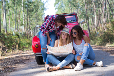 Group of friends on a roadtrip through countrysideの写真素材