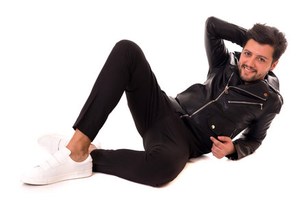 Studio picture of a young and handsome man posing isolatedの写真素材