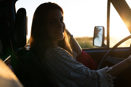 summer holidays, road trip, travel and people concept, young woman resting in minivan car