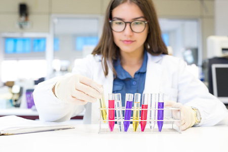 Beautiful young scientist working at the laboratoryの写真素材