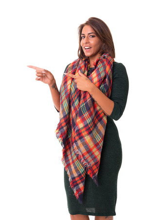 Young beautiful african woman presenting your product, isolated over white backgroundの写真素材