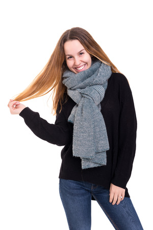 Studio shot of a beautiful young casual womanの写真素材