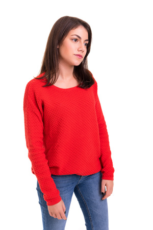 Studio shot of a sad woman, isolated over whiteの写真素材
