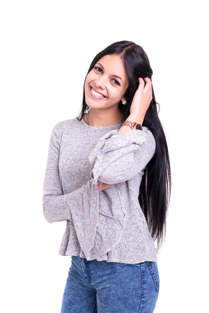 Studio shot of a beautiful young casual womanの写真素材