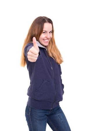 Beautiful young woman signaling ok, isolated over whiteの写真素材