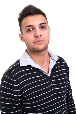Studio picture of a young and handsome man posing isolatedの写真素材