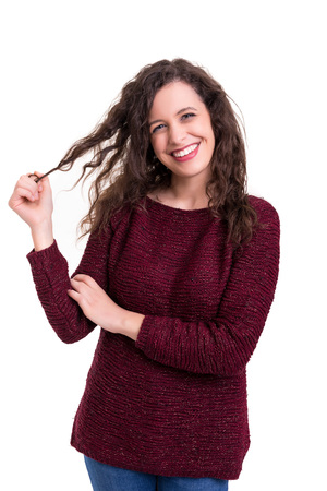 Studio shot of a beautiful young casual womanの写真素材