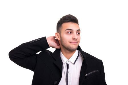 Studio picture of a young and handsome man posing isolatedの写真素材